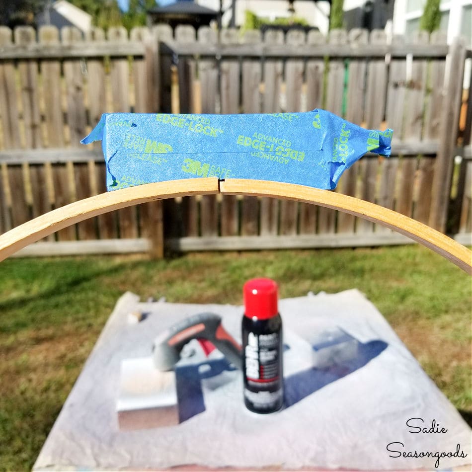 taping off the top of a large embroidery hoop