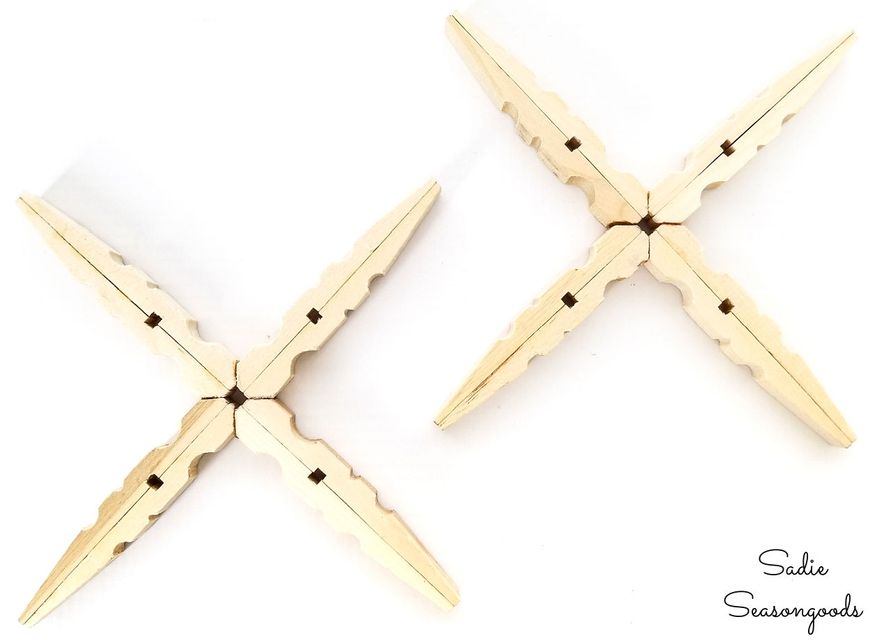 building the clothespin snowflakes to use as christmas ornaments