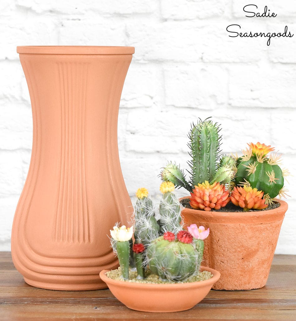 terracotta paint on a clear glass vase