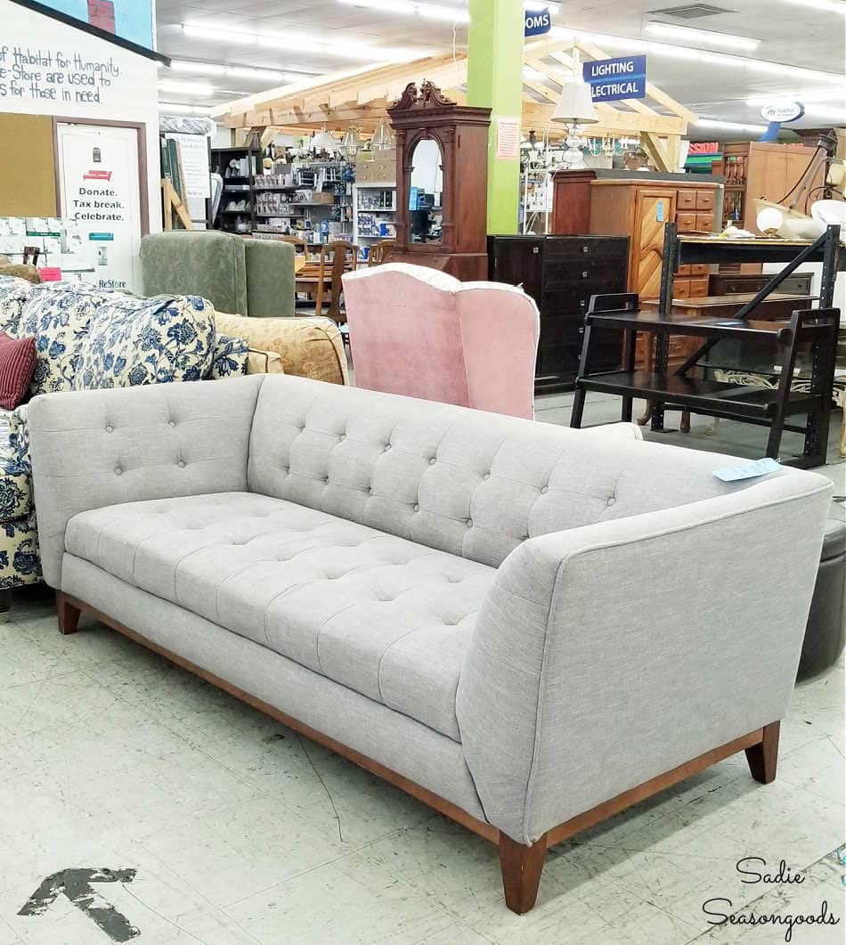 gray tufted sofa