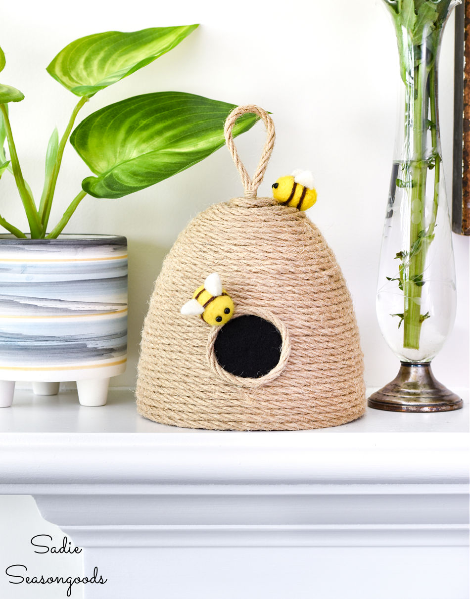 upcycling a light fixture as beehive decor