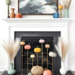 decorating the fireplace and mantel in modern fall decor