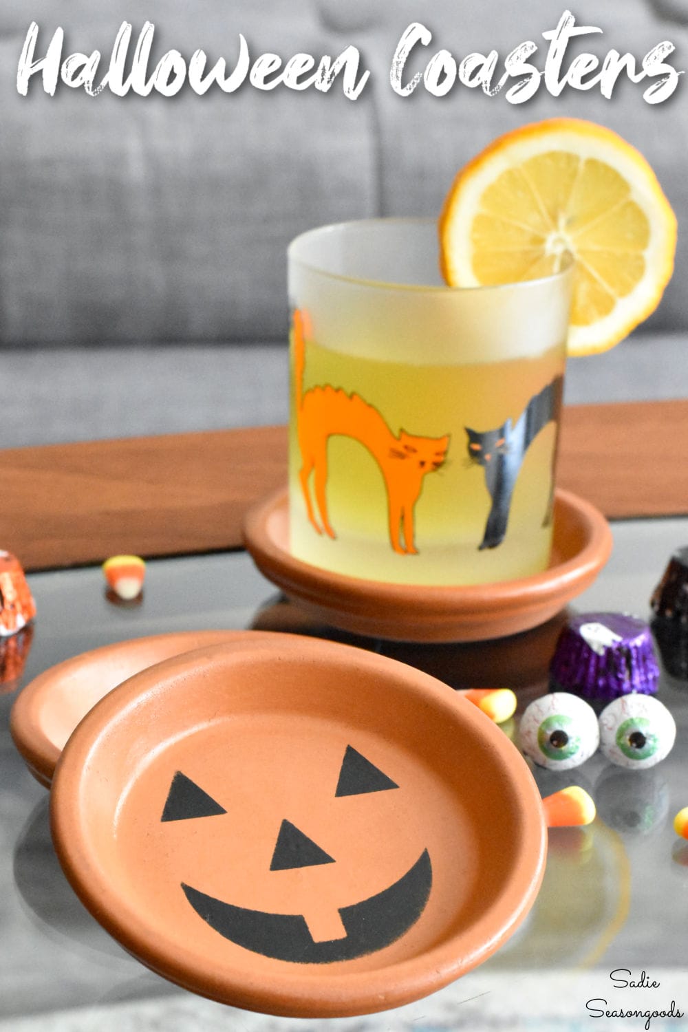 pumpkin coasters that are terracotta jack-o-lanterns