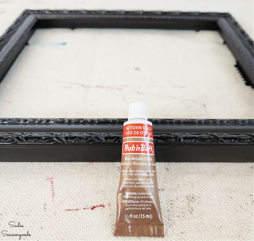 metallic wax to accent the details on a painted picture frame