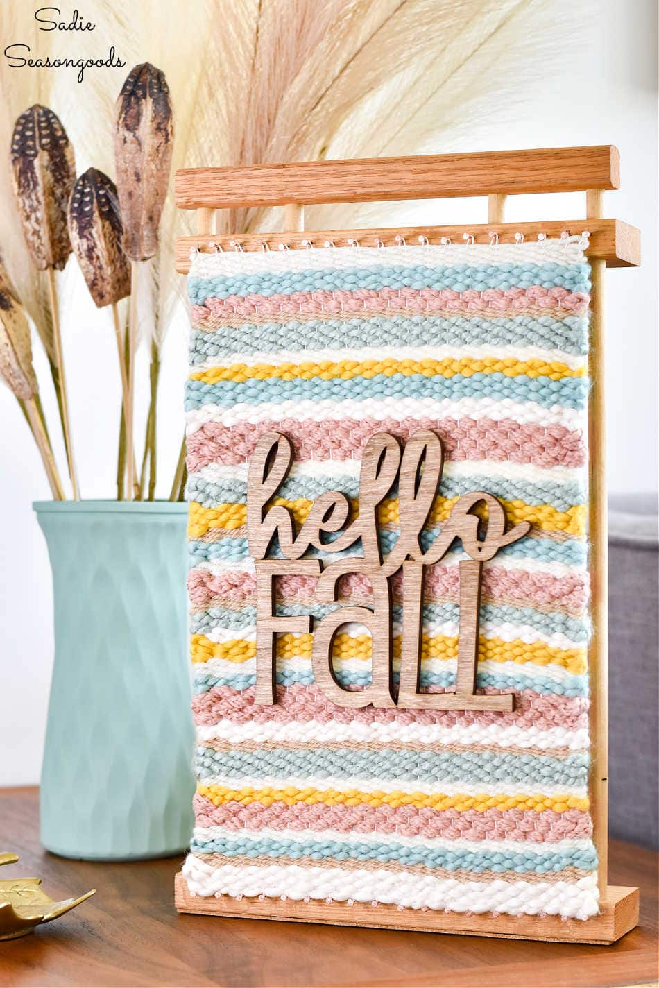 displaying a hello fall sign on a casserole dish holder that was upcycled into a diy loom