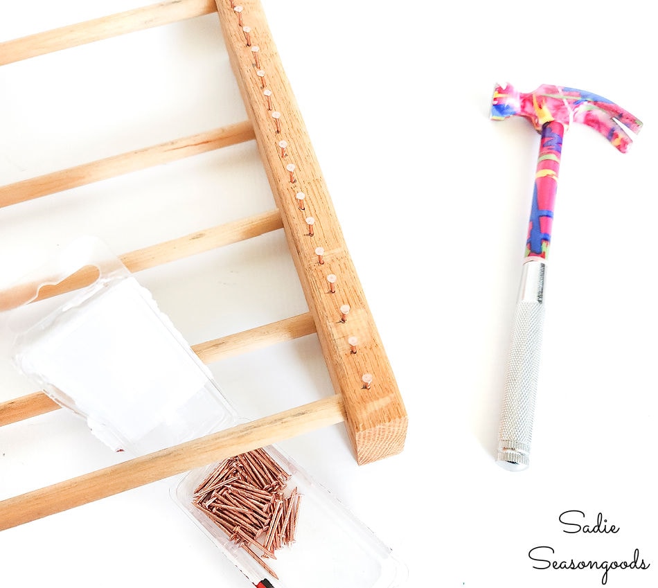 nails on a diy loom for warping the loom