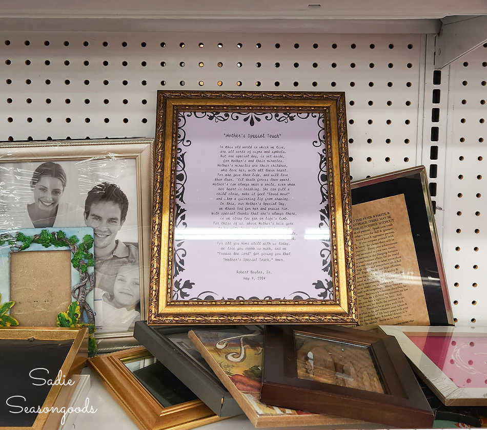 picture frame with embossed details at a thrift store
