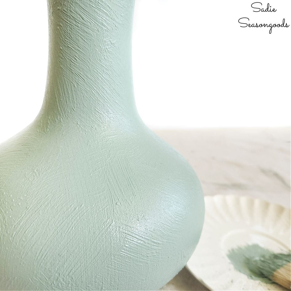 terracotta paint on a plain glass vase using a textured paint on a clear glass vase