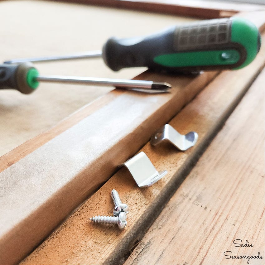 canvas clips to hold a painting in a frame