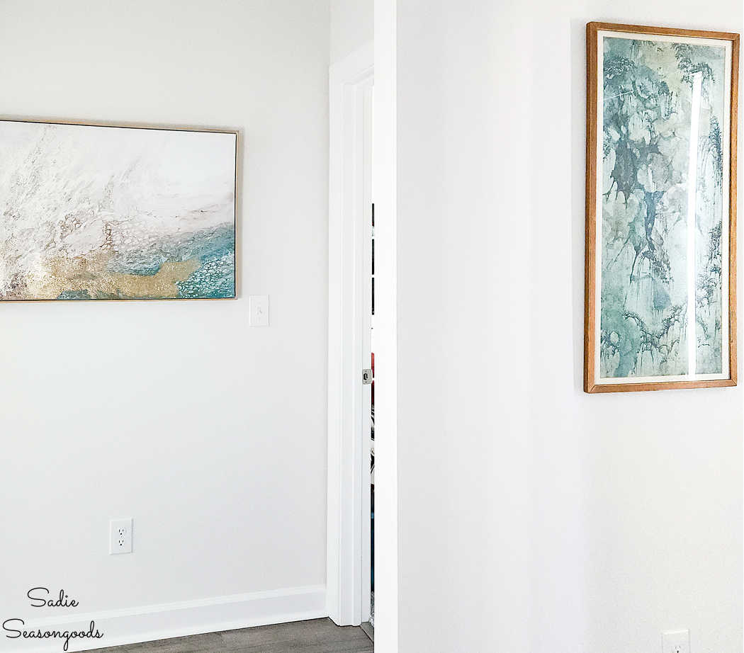 entryway decor with thrift store art
