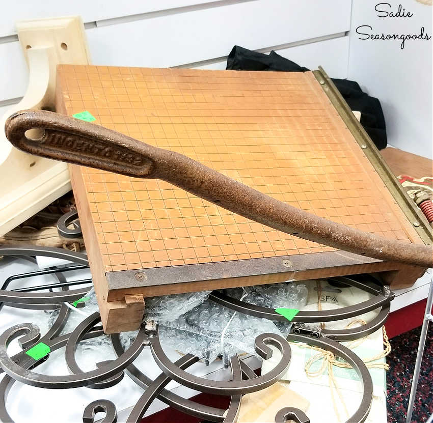 vintage paper cutter at a thrift store