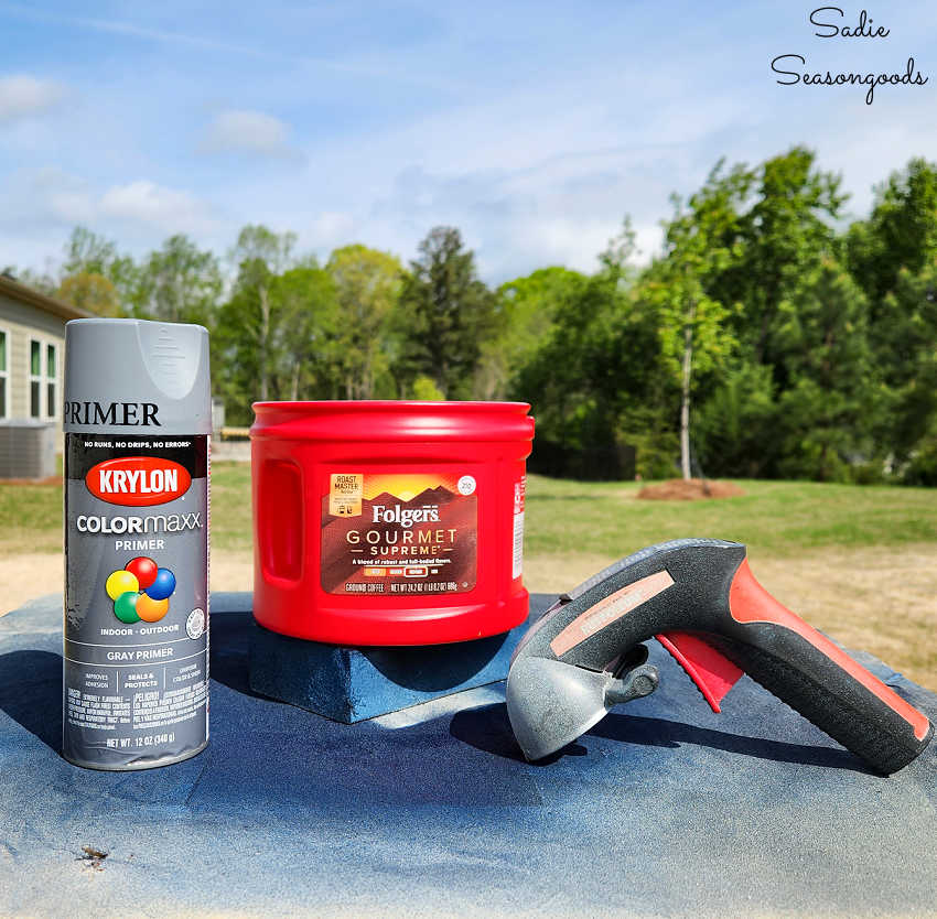 painting a plastic coffee can with primer