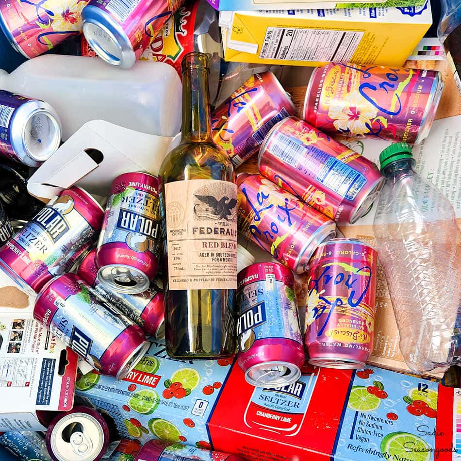 bottles and cans in a recycling bin