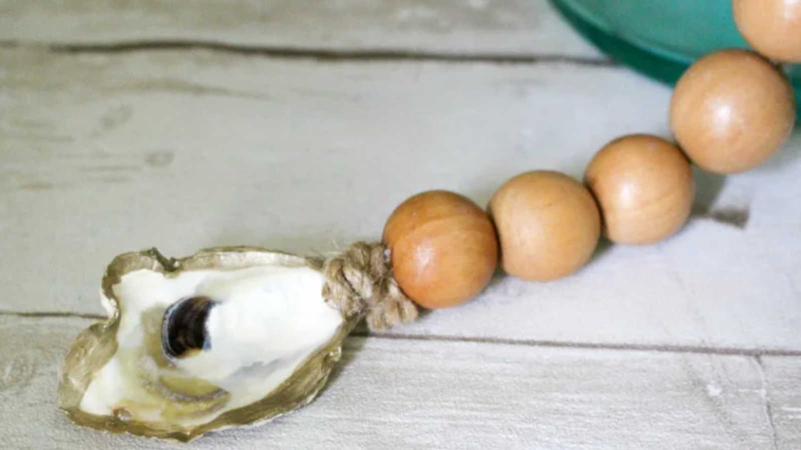 beaded garland with an oyster shell