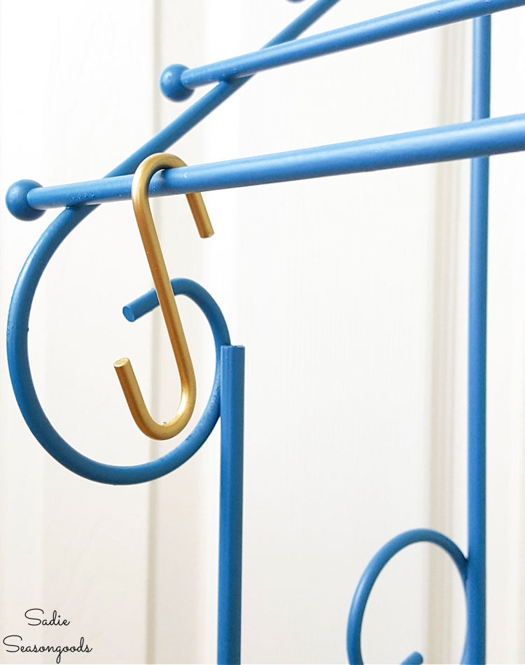 hooks for more storage options on a closet organizer