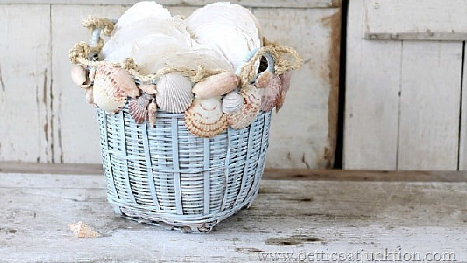 decorating a basket with seashells