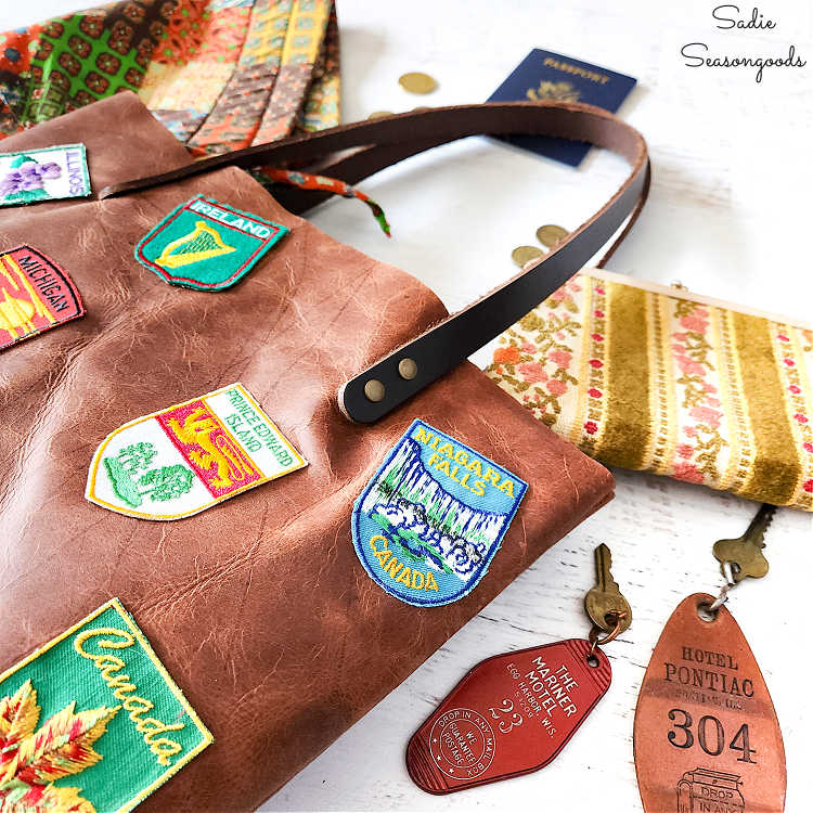 covering a leather tote bag in travel patches