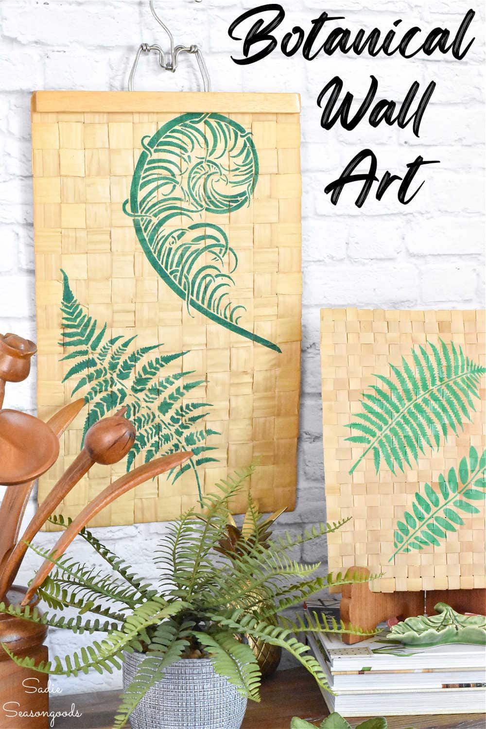 botanical wall hangings on palm mats