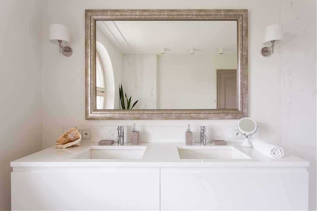 framed mirror as bathroom decor