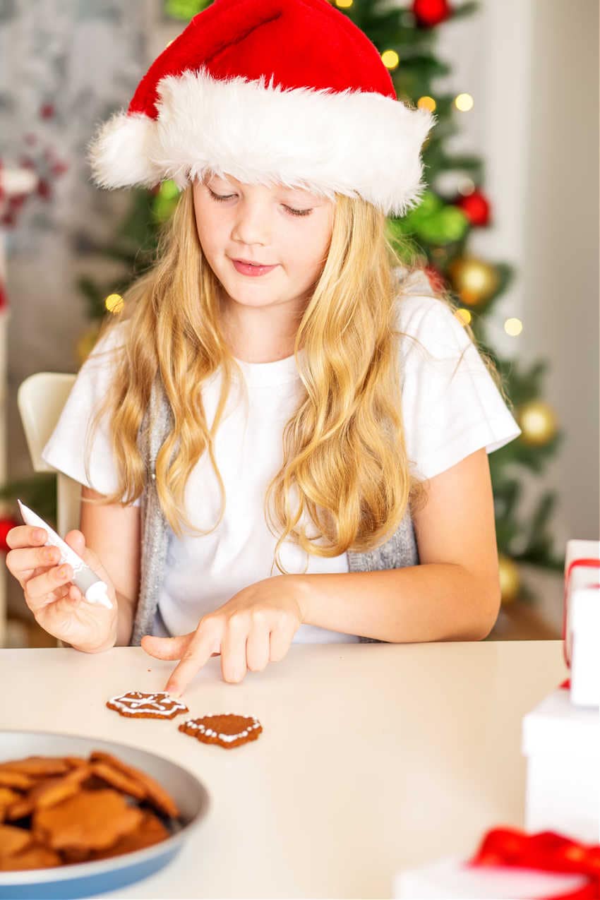 decorating christmas cookies at a party