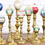 vintage brass candlesticks as a christmas ornament display