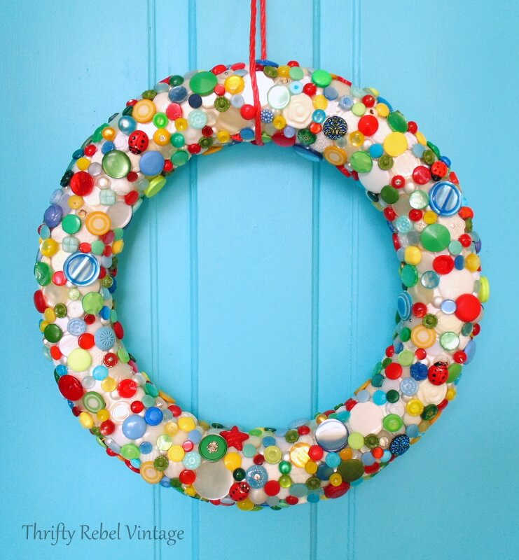 decorating a wreath form with buttons