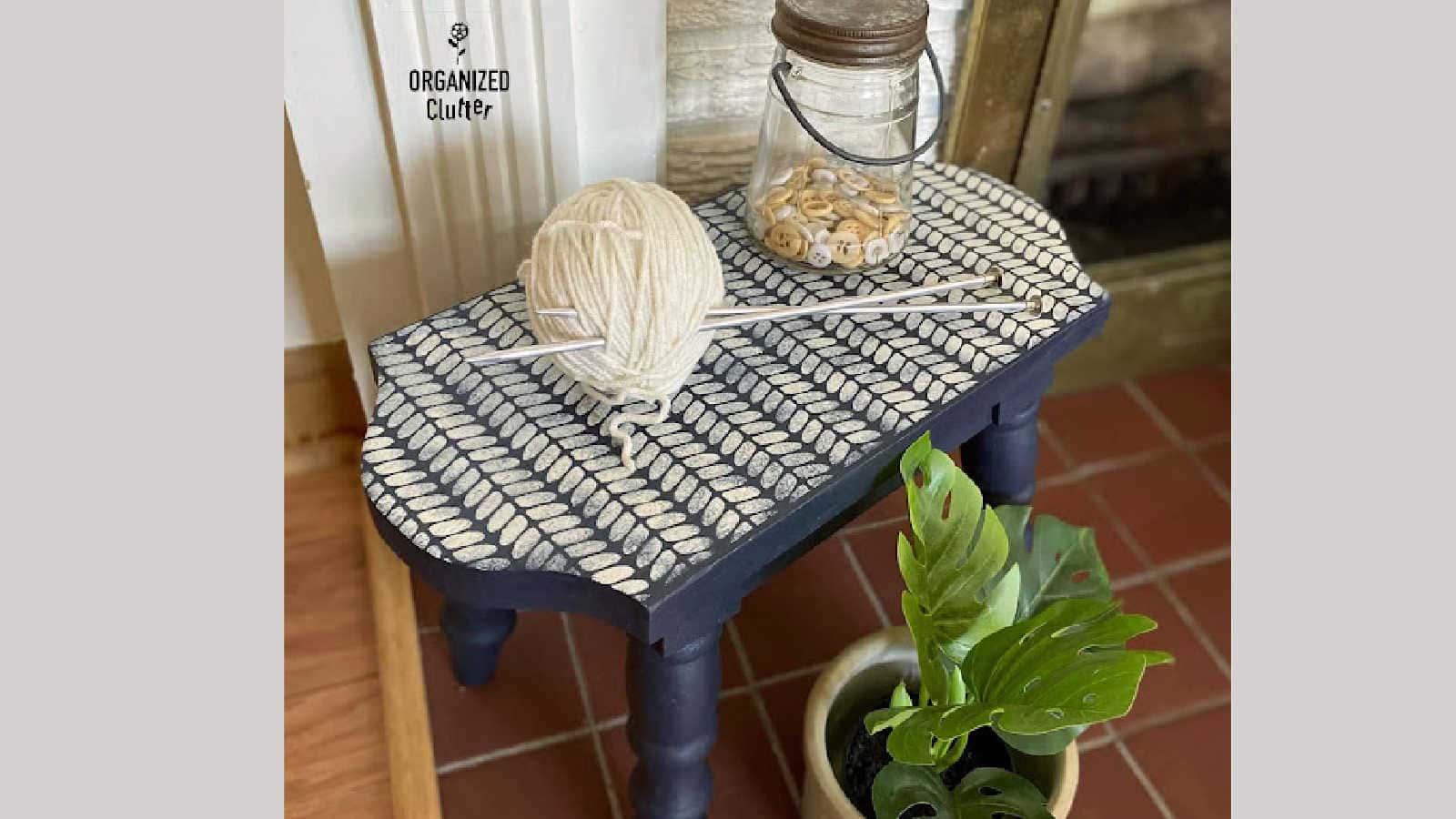 knitted pattern stencil on a stool