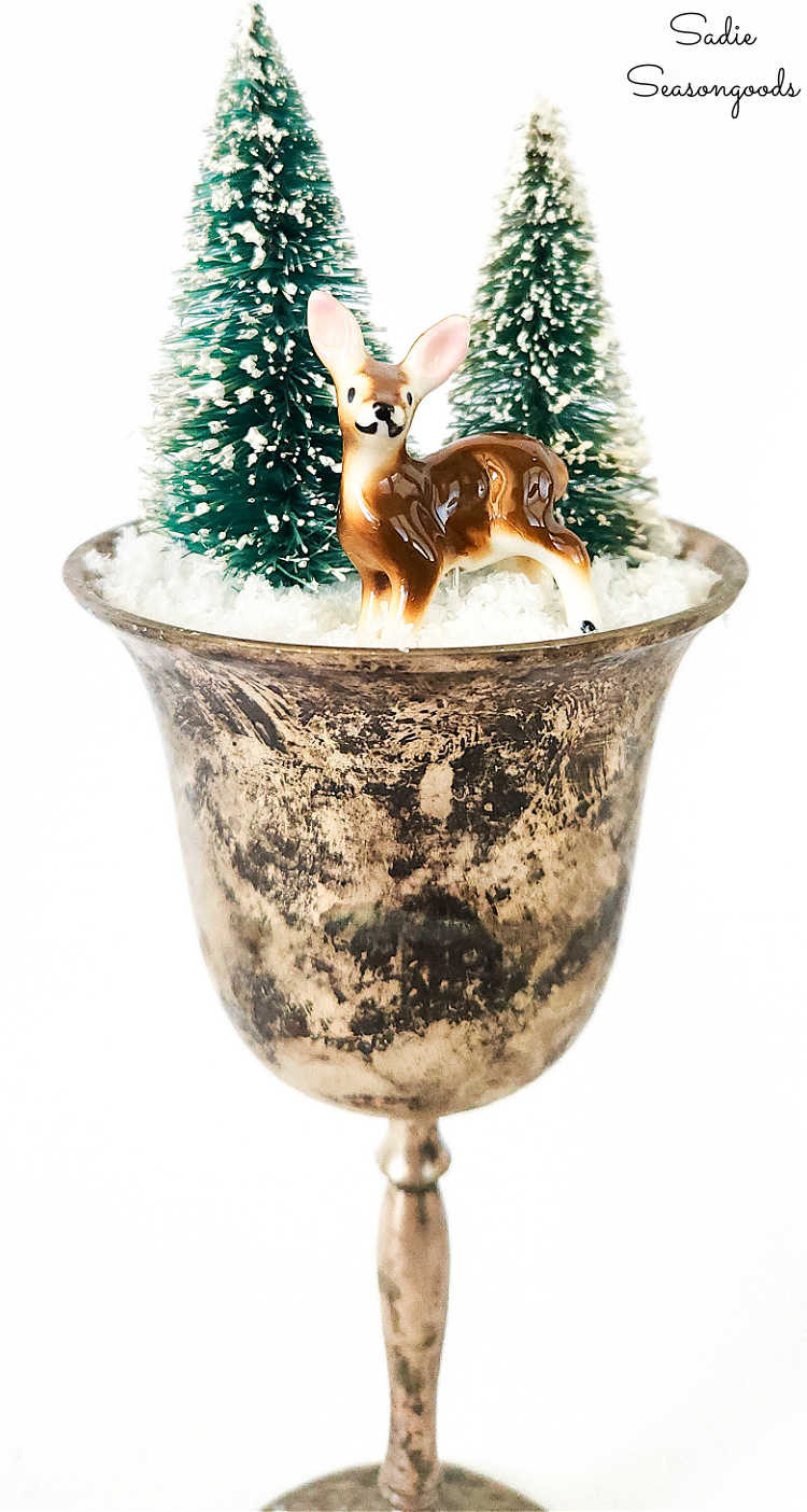 snow scene in a silver plate goblet