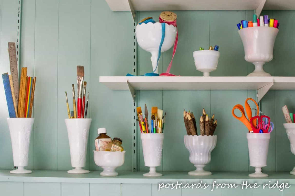 organizing craft supplies in vintage milk glass