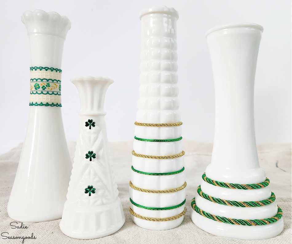 milk glass vases that have been decorated for spring