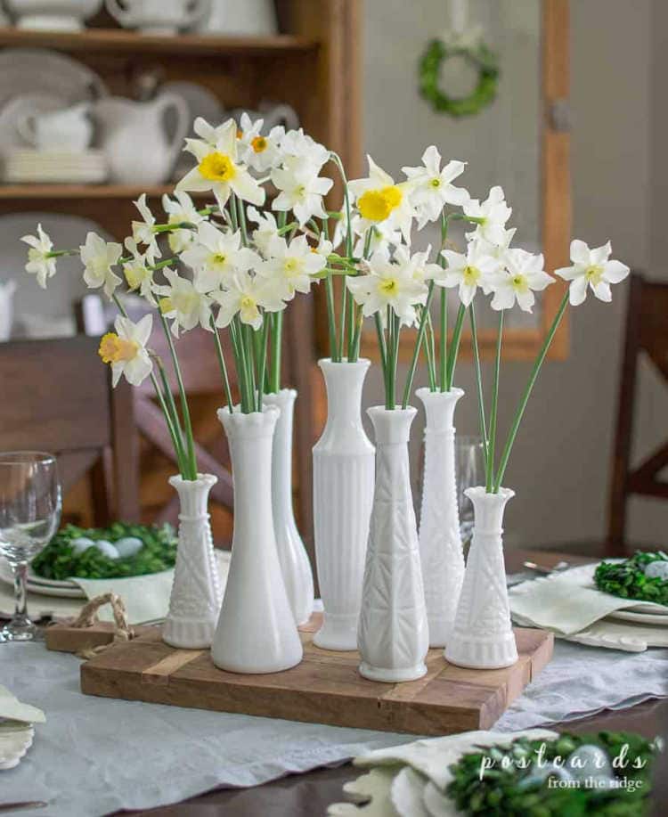 mismatched collection of milk glass vases