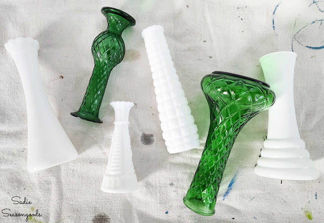 milk glass and green glass vases