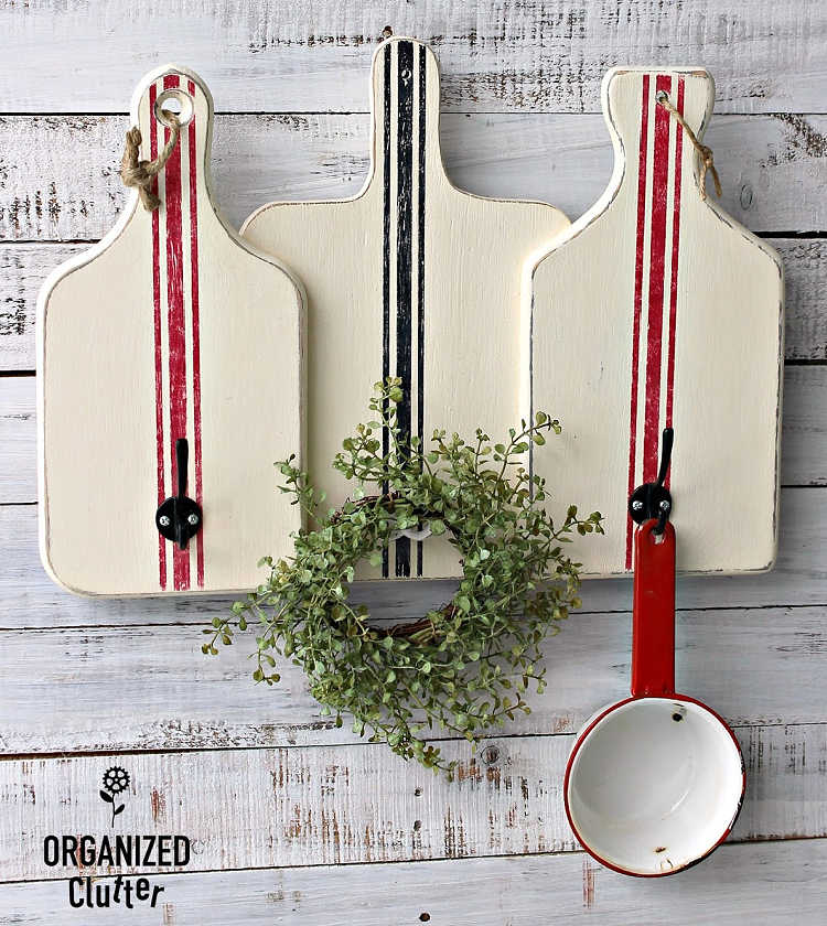 thrift store cutting boards as farmhouse kitchen decor