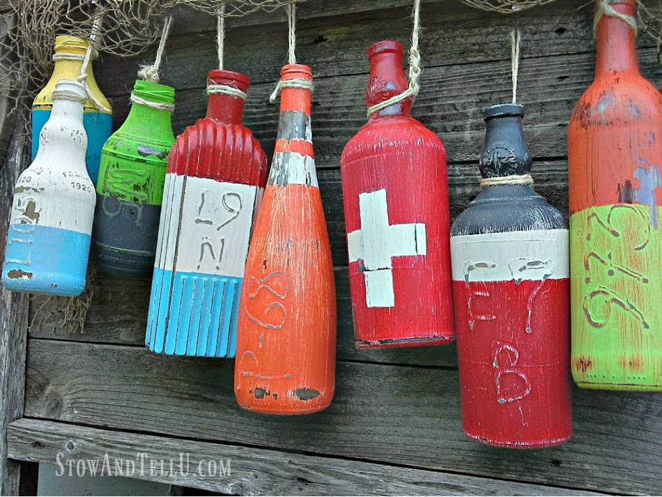 wine bottles painted to look like buoys