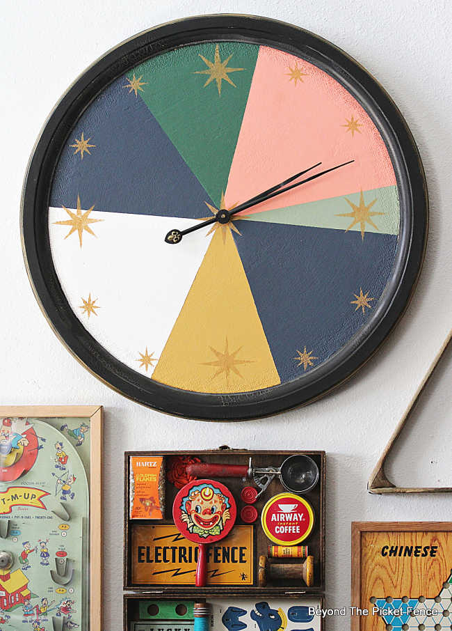 repurposed farmhouse clock as mid century modern decor