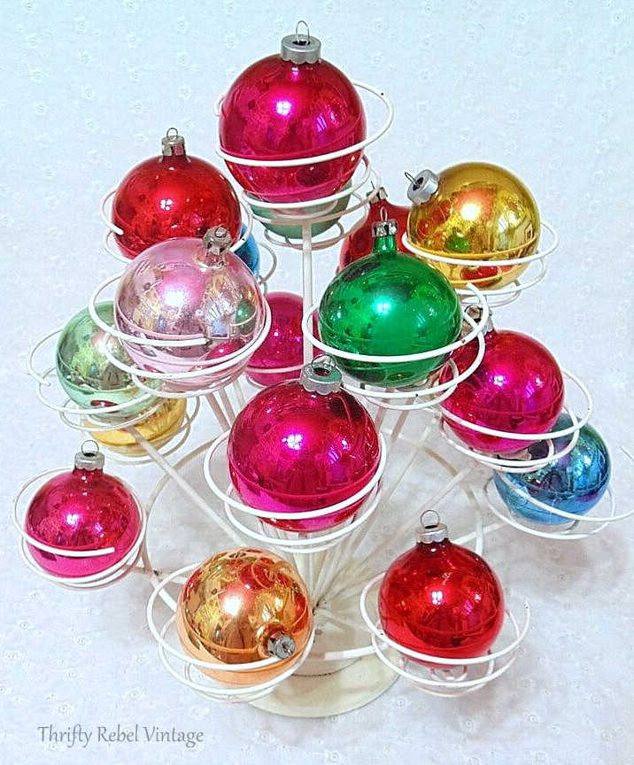 vintage christmas ornaments in a cupcake holder