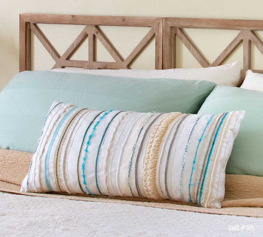 yarn embellished throw pillow