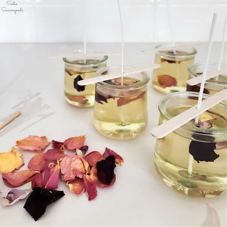 hand poured candles in yogurt jars