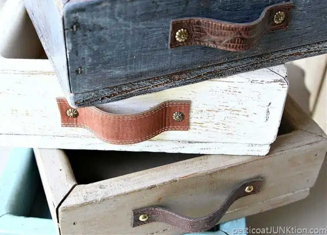 leather handles on wooden trays