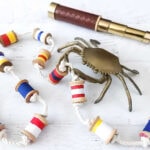 buoy garland with vintage wooden spools