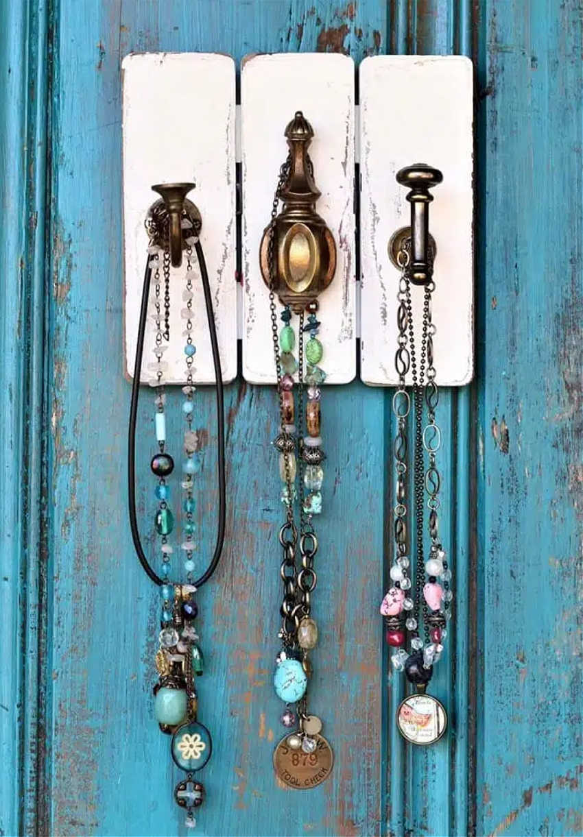 jewelry hanger on a thrift store sign