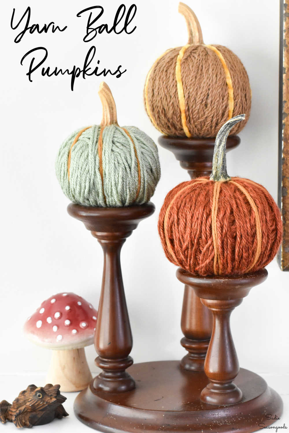 autumn decor with yarn pumpkins