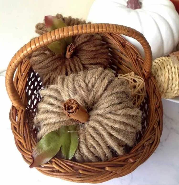diy pumpkins with cinnamon sticks as stems
