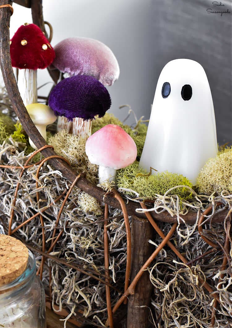 ghost candle with mushrooms