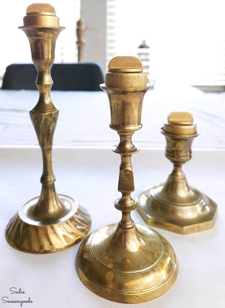 turning brass candlesticks into christmas card holders
