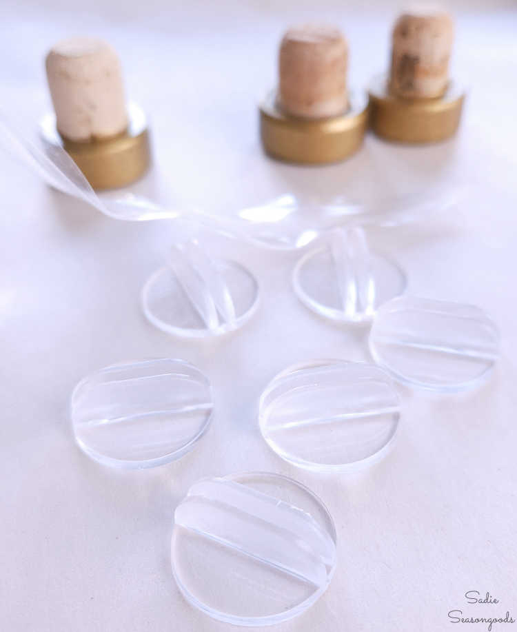 plastic place card holders to be attached to the bar top corks