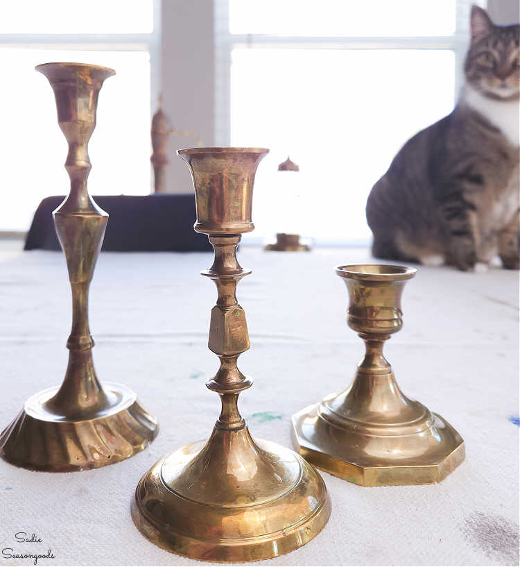 mismatched brass candlesticks