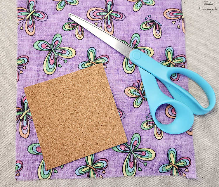 cutting squares of fabric from scraps