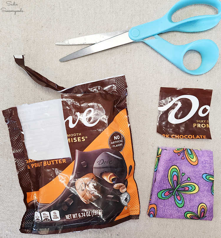 cutting up a plastic bag to make crinkle cat toys