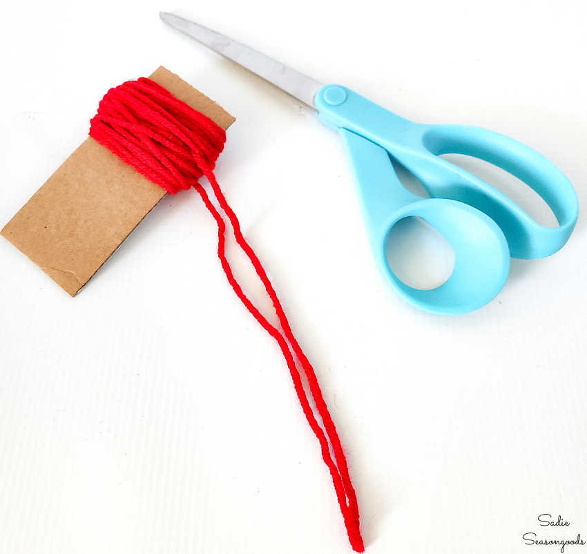 making pompoms from leftover yarn